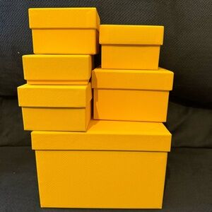 Swarovski yellow boxes empty.